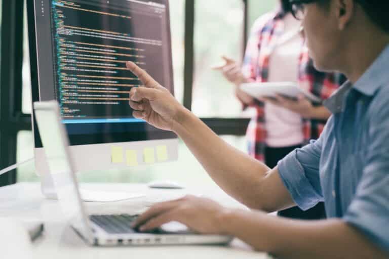 man in smb developing cybersecurity strategy on computer