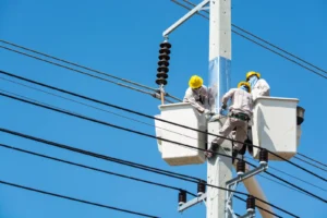 Utility line workers in a bucket truck