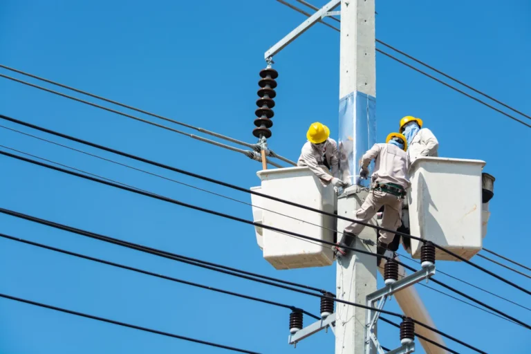 Utility line workers in a bucket truck